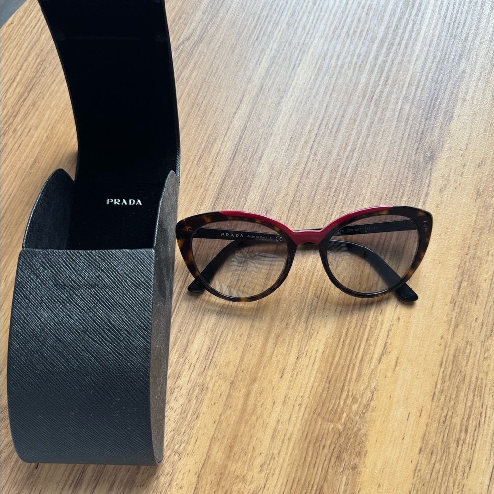 Prada Women's Sunglasses in Red and Brown